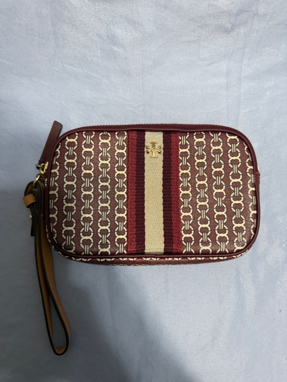 Tory Burch Burgundy and Cream Signature Wristlet with Stripe Detail